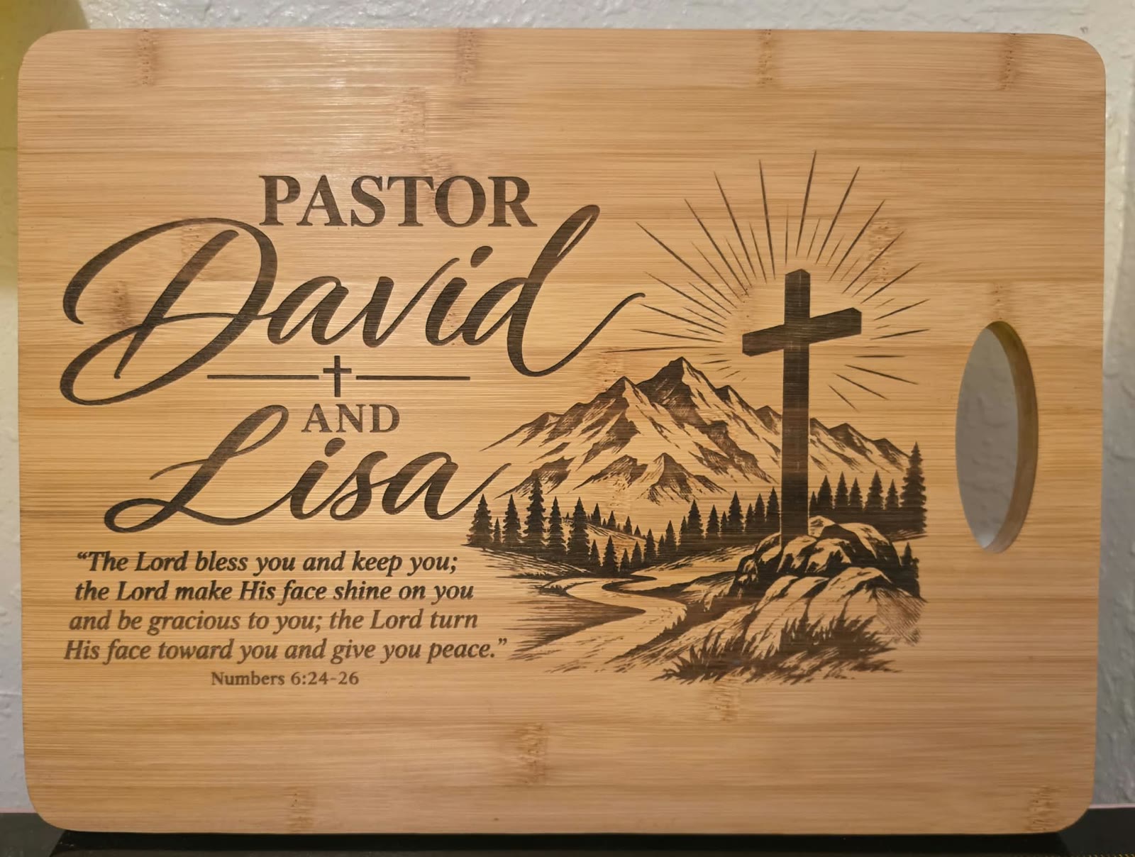 Bamboo board for Pastor David and Lisa with a mountain, a cross, and a blessing